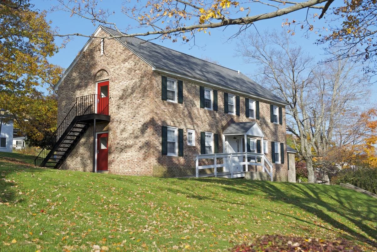 Classic three-story triple-decker home in a Greater Boston neighborhood
